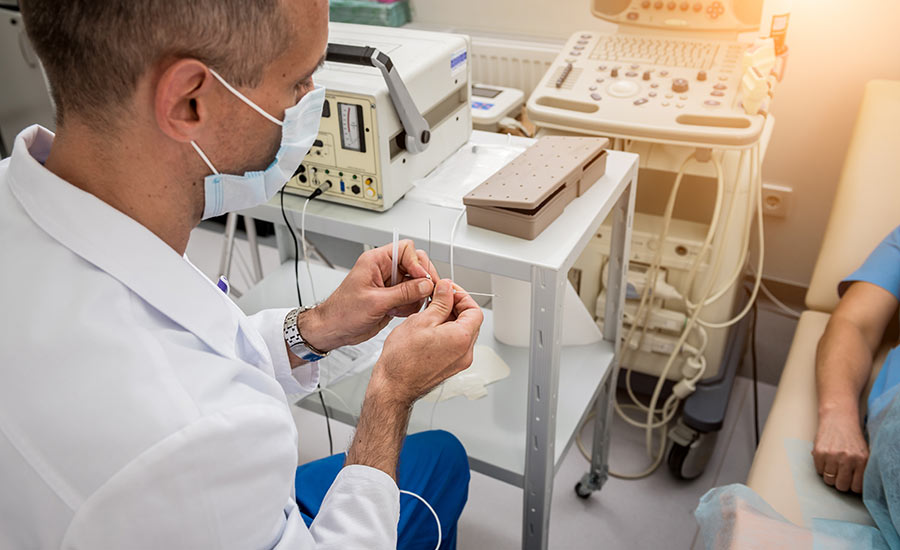 Doctor performing a radiofrequency ablation