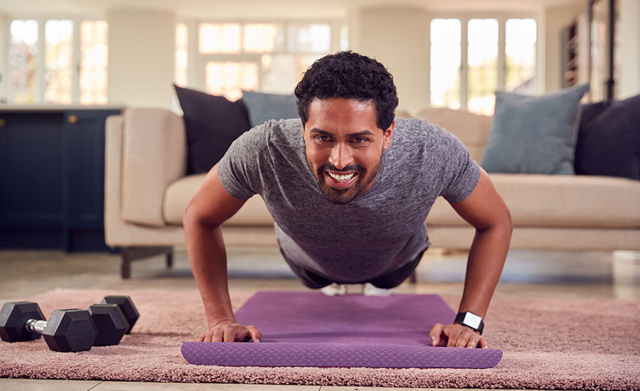 Man doing pushups at home