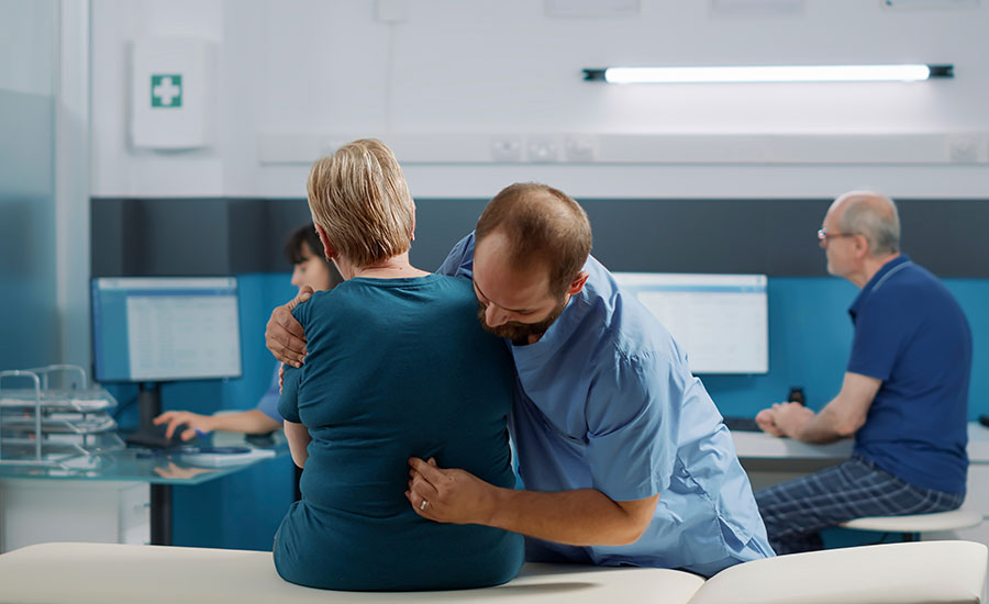 A therapist examining a patient